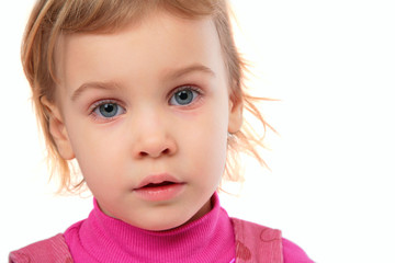 Little girl in pink dress face close-up