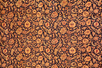 fragment of carpet with floral ornament
