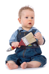 Beautiful baby with paint brush