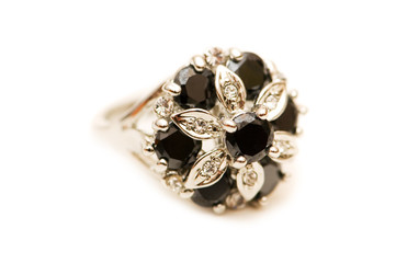 Earring with balck and silver stones isolated on white