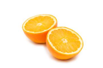 Two half-cut oranges isolated on white background
