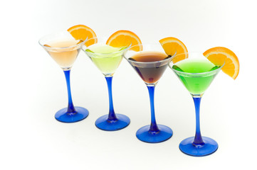 Colourful cocktail in glasses with ice