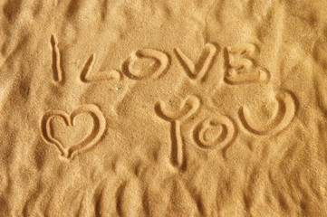 I love you written on sand
