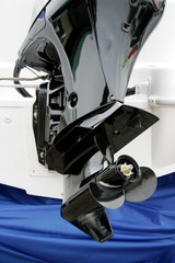 The new black screw motor for a white boat © Tanya Strelnikova