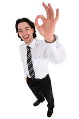 Businessman giving OK gesture 