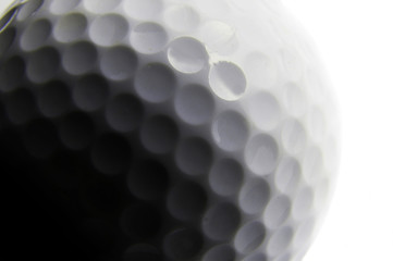 golf ball closeup, in black and white