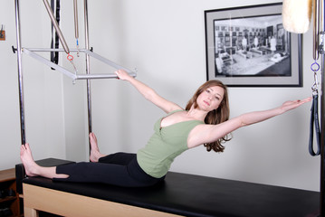 Pilates Workout on Trapeze Table