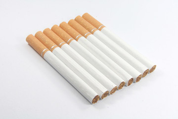 A lot of cigarettes on a white table