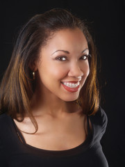 Young black woman with big smile and braces