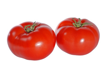 Fresh juicy tomatoes isolated on white background