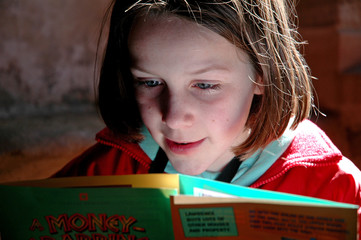 girl engrossed in book