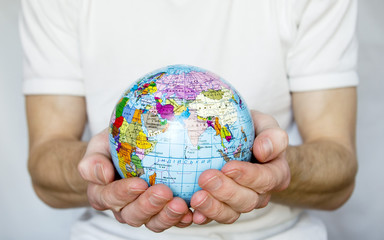 Hands holdings  globe