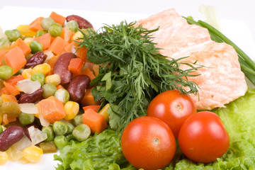 Stake from a salmon with vegetables