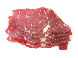 Prosciutto crudo ham isolated on white background