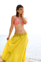 woman standing on the beach relaxing