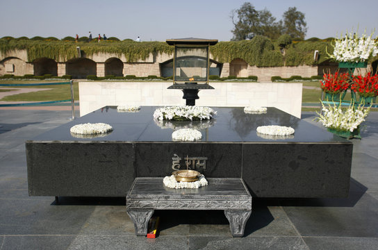 gandhi's memorial tomb stone in rajghat, delhi, india
