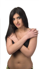 Fototapeta premium Young woman in bra and panties arms covering