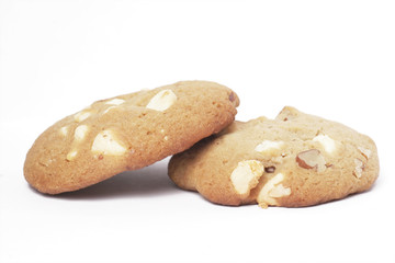 Two Cookie Biscuits With White Chocolate And Nuts