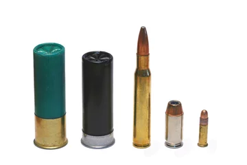 Rolgordijnen Isolated assorted ammunition  on white © Jim Mills
