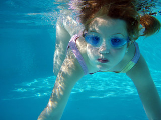 underwater swimming girl