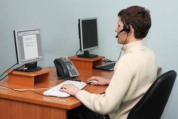 Man working with a computer in office