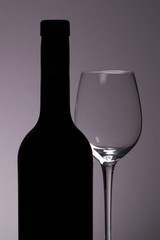Wine bottle and glass