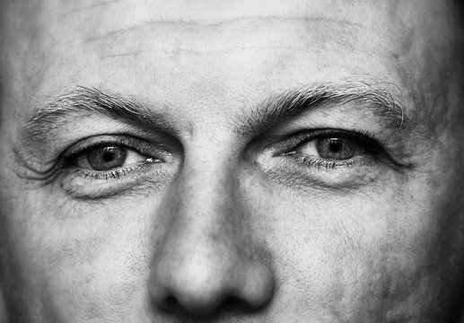 Eyes of a mature man in black and white.