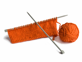 Thread and a spoke for knitting on a white background