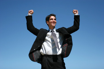 Businessman jumping for success