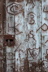 Western Barn Door Covered With Brands