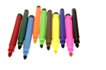 Colorful pens on white background