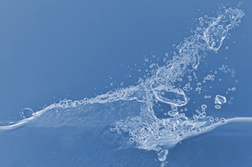 Obraz na płótnie Canvas Abstract wave splash blue background