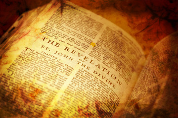 Fototapeta premium Open Bible showing The Revelation