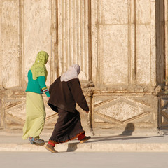 TWO MOSLEM WOMEN GOING TO PRAY