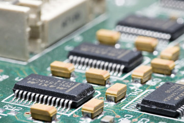 Close-up on a microchip on a scheme background