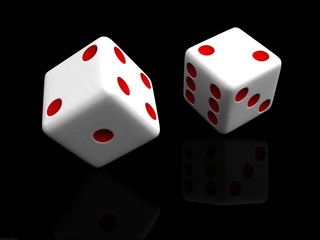 dice against black background