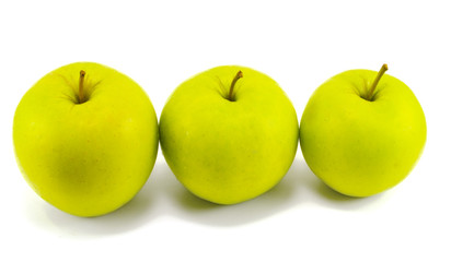 three fresh apples on white