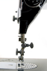 old sewing machine isolated on white