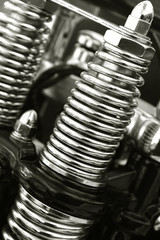 chromed motorcycle suspension springs close-up - obrazy, fototapety, plakaty