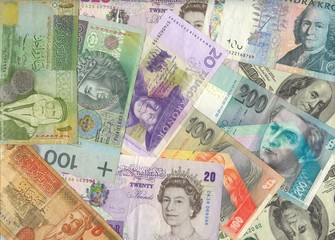 Global economy. International banknotes. Mixed currencies.