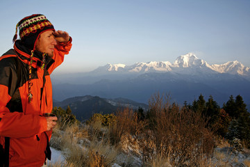 mountaineerer looking at a mountain range
