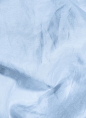 Crumpled satin fabric background - series - blue, azure.