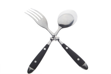 fork and spoon crossed on white