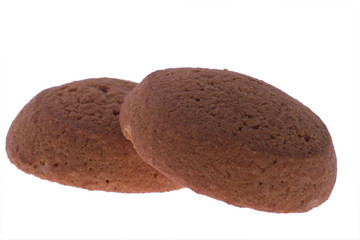 two oatmeal cookies on white