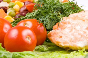 Stake from a salmon with vegetables