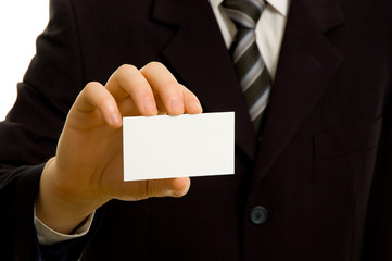 Businessman holding blank business card