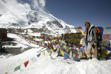 Trekker at Thorong-La pass, annapurna, nepal