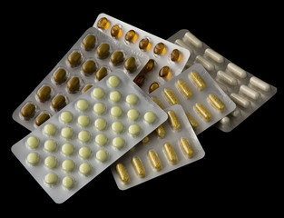 Vitamin Pills isolated on black