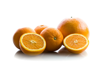 Fresh orange fruits on white background
