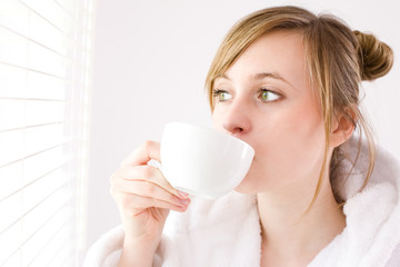 woman drinking coffee